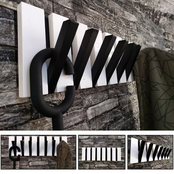 علاقة ملابس خشبية على...