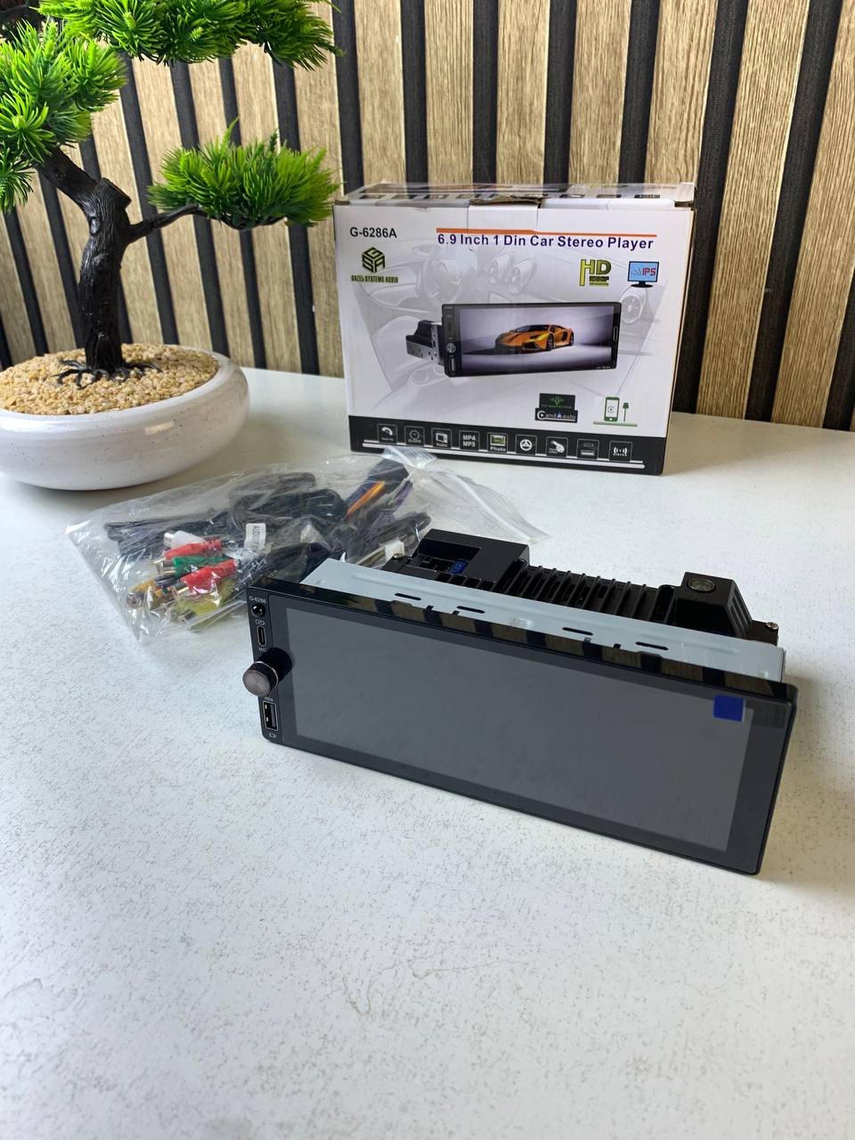 جهاز راديو سيارة 1DIN بشاشة لمس 6.9 بوصة يدعم Apple CarPlay اللاسلكي وAndroid Auto - الصورة 6