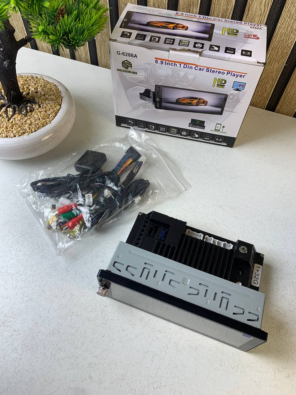 جهاز راديو سيارة 1DIN بشاشة لمس 6.9 بوصة يدعم Apple CarPlay اللاسلكي وAndroid Auto - الصورة 2