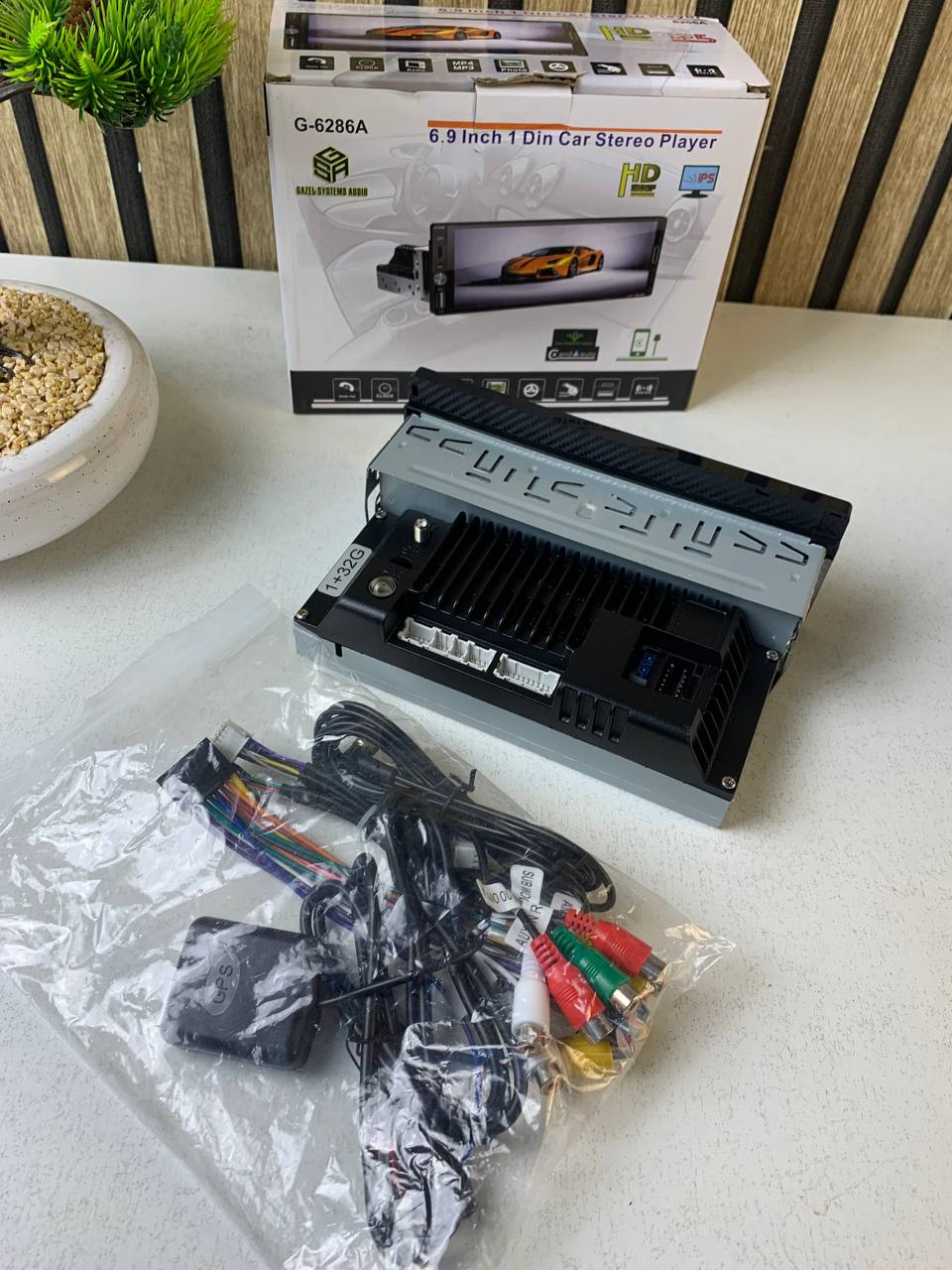 جهاز راديو سيارة 1DIN بشاشة لمس 6.9 بوصة يدعم Apple CarPlay اللاسلكي وAndroid Auto - الصورة 4